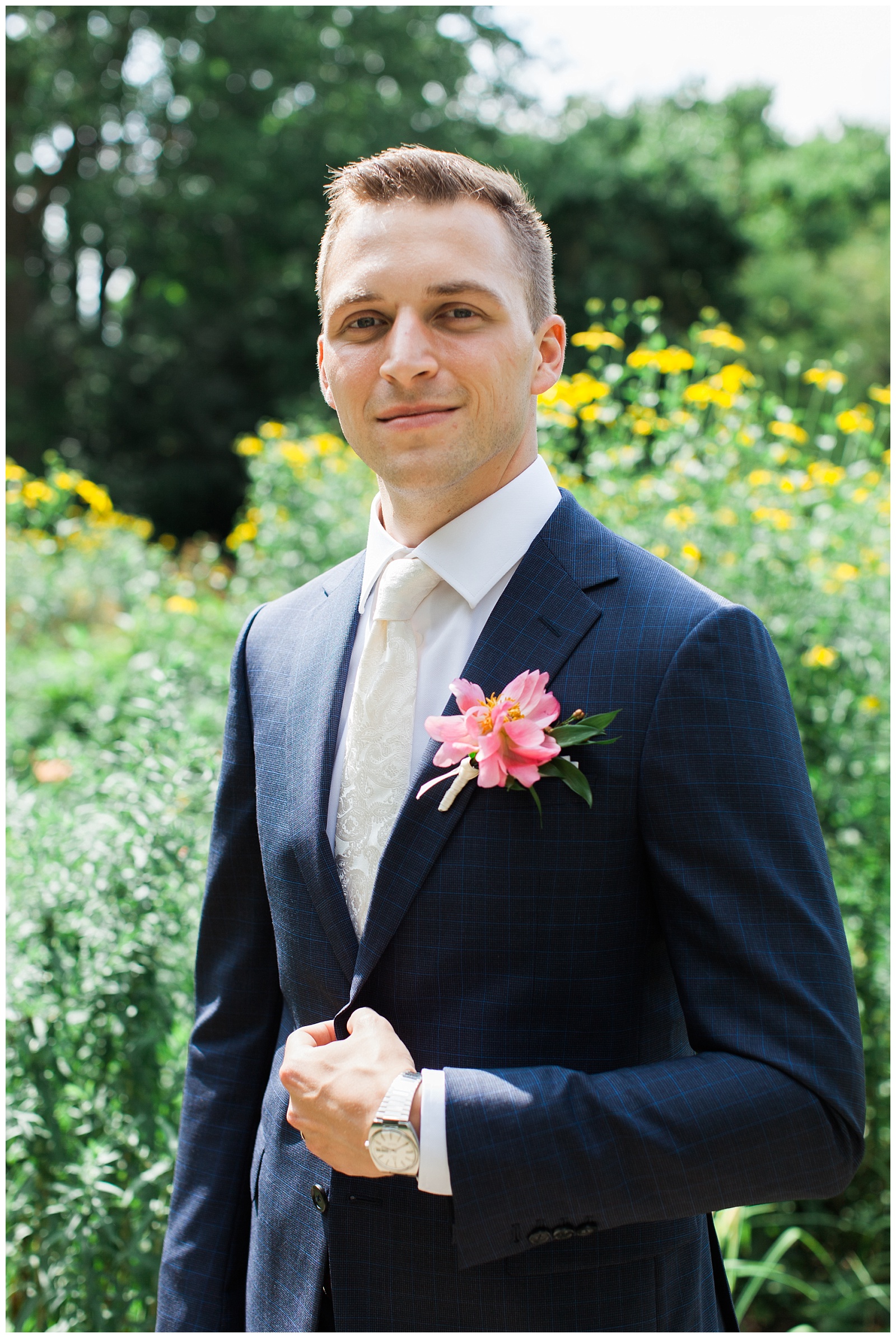 Handsome groom in navy pinstripe suit with watch and pink boutonniere at Guelph Ontario Wedding | Ontario Wedding Photographer | Toronto Wedding Photographer | 3photography