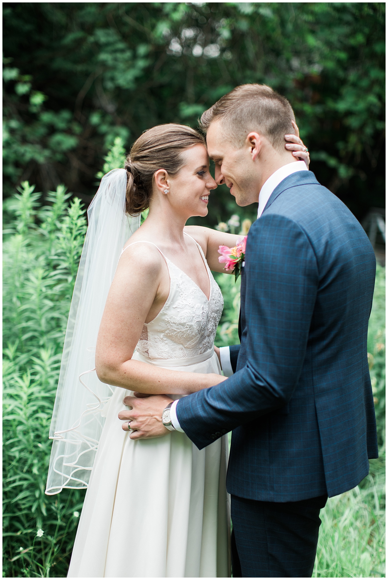 Bride and Groom touching noses in embrace with greenery backdrop at Guelph Ontario Wedding | Ontario Wedding Photographer | Toronto Wedding Photographer | 3photography