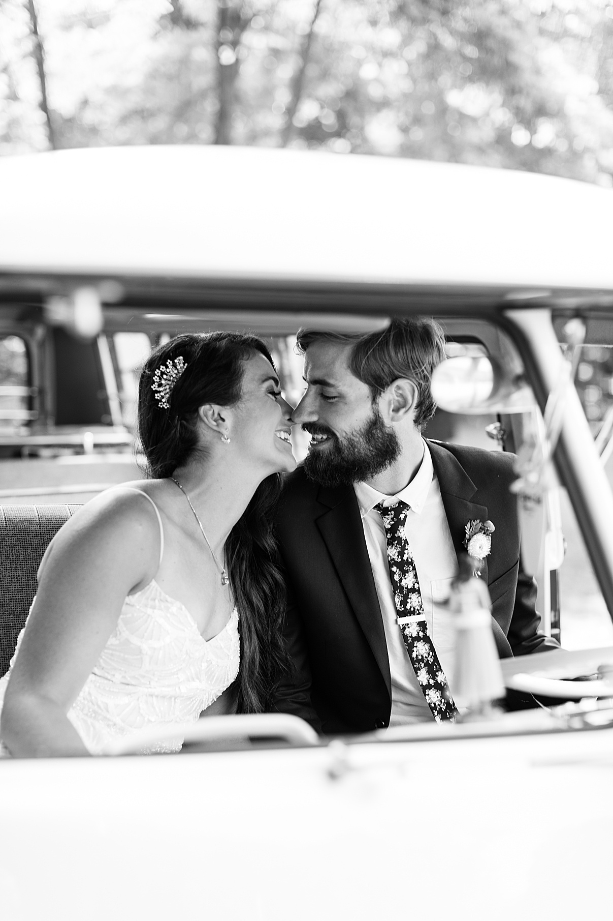 Black and white bride and groom kissing inside vintage bus | Balls Falls, Ontario Wedding| Ontario Wedding Photographer| Toronto Wedding Photographer| 3Photography| 3photography.ca