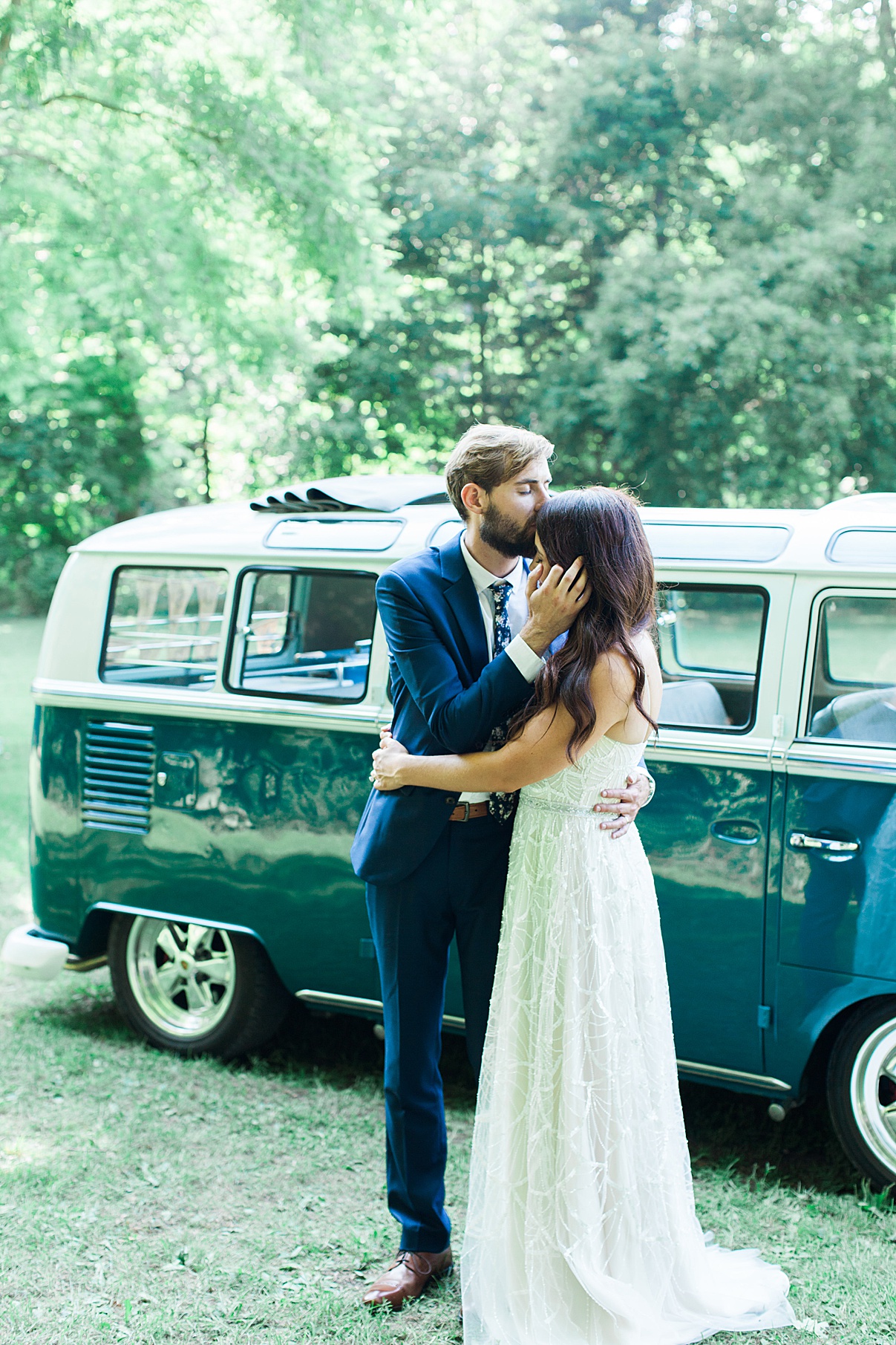 Groom kisses bride on forehead in front of vintage bus| Balls Falls, Ontario Wedding| Ontario Wedding Photographer| Toronto Wedding Photographer| 3Photography| 3photography.ca