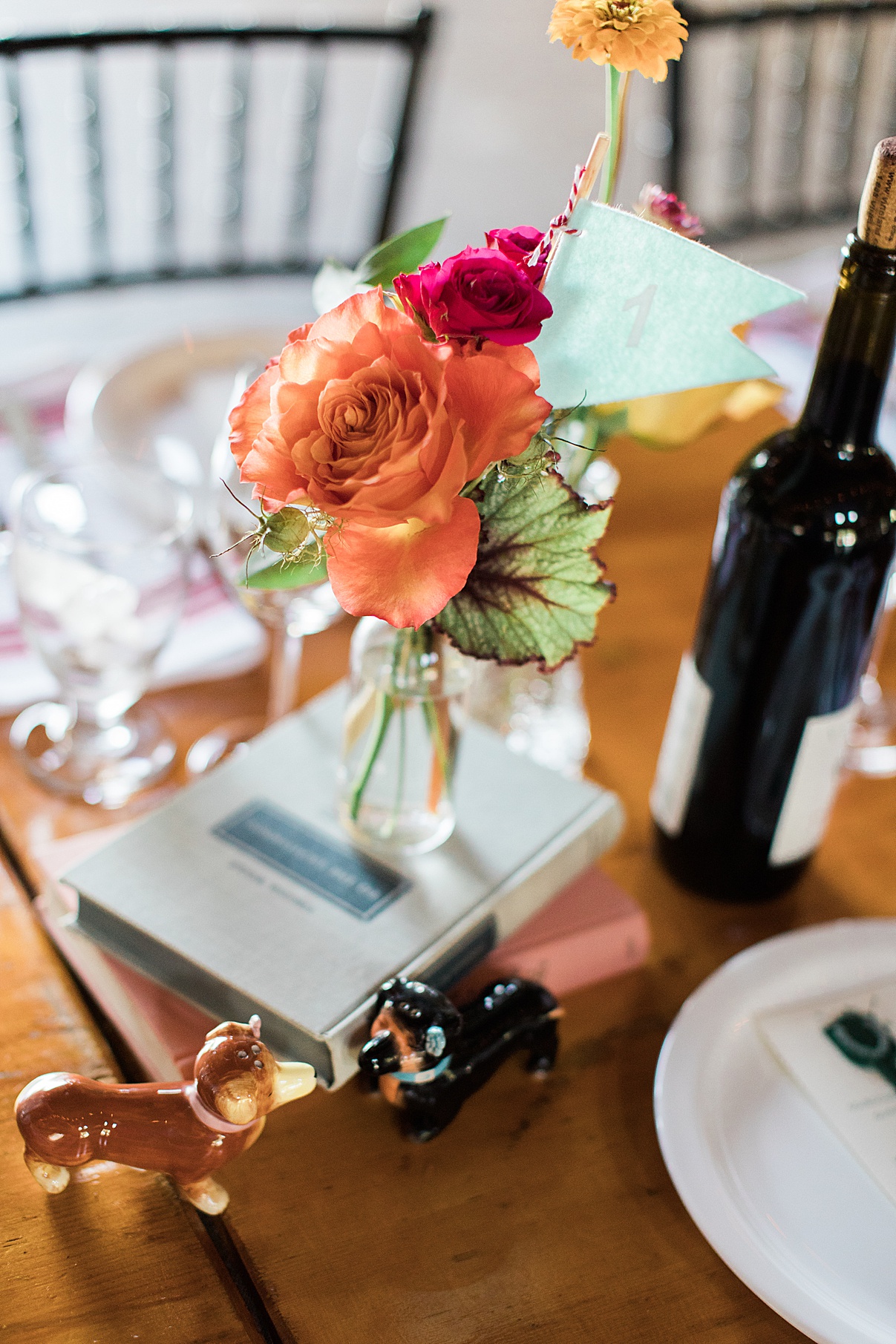 Single flower on book for table setting at reception at Balls Falls, Ontario Wedding| Ontario Wedding Photographer| Toronto Wedding Photographer| 3Photography| 3photography.ca