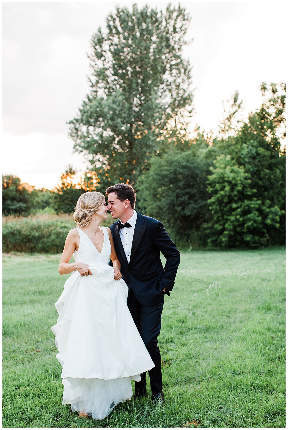 Bride and groom stand in field nuzzling noses at sunset| Ontario wedding| Toronto wedding photographer| 3photography