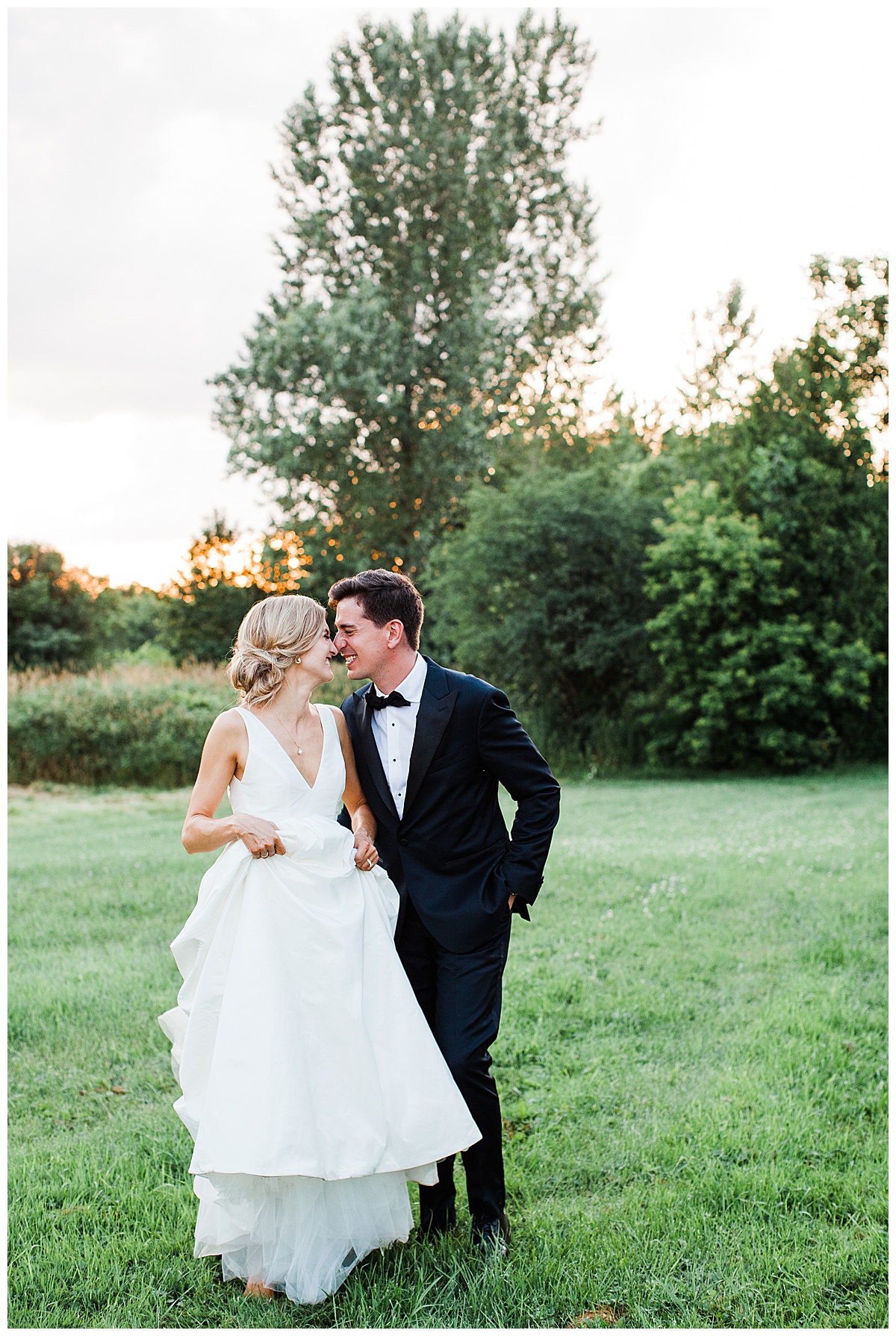 Bride and groom stand in field nuzzling noses at sunset| Ontario wedding| Toronto wedding photographer| 3photography
