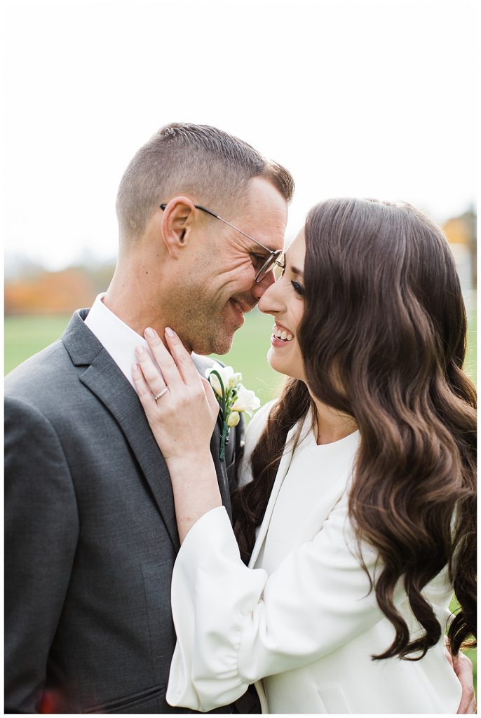 Bride laughing in grooms ear- wedding portrait| Toronto wedding photographer| Toronto engagement photographer| 3photography