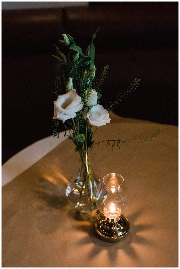 candle lamp and white rose centerpiece in Maple Leaf Tavern| Maple Leaf Tavern wedding| Downtown Toronto wedding| Toronto wedding photographer| Toronto engagement photographer| 3photography