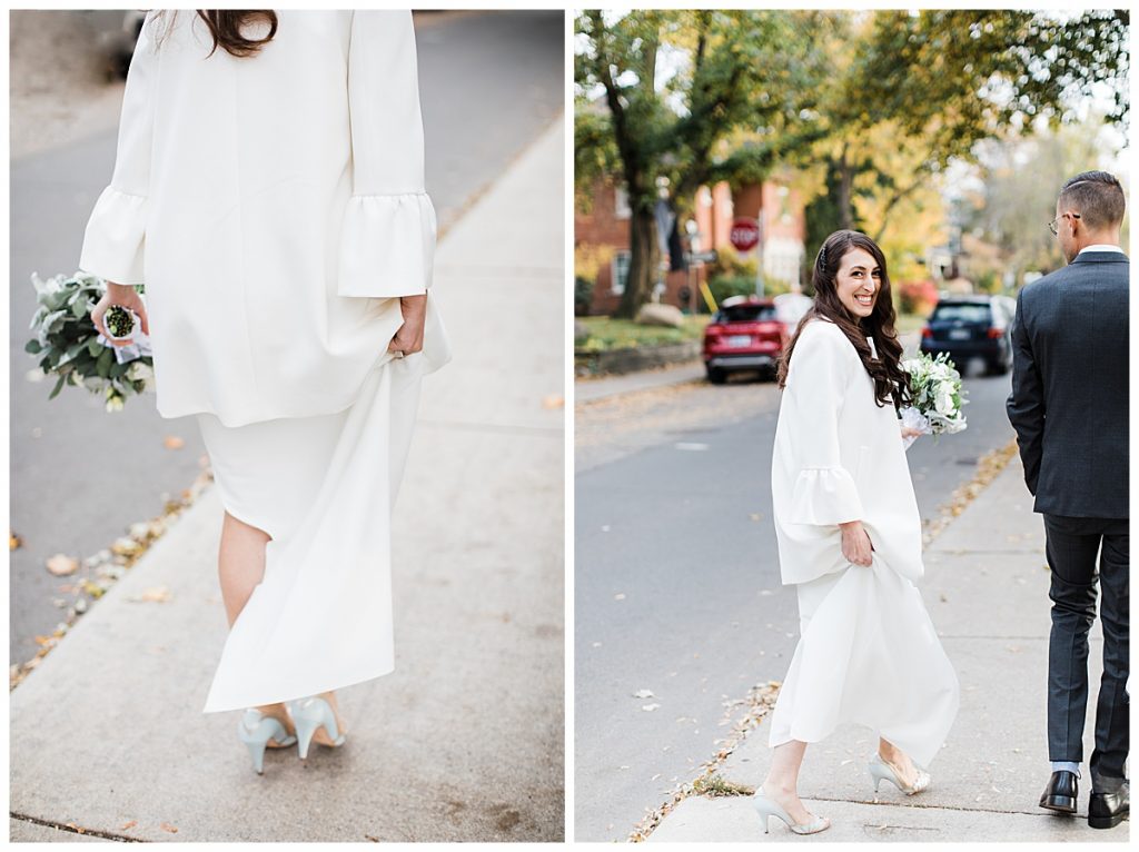 Bride and groom walk down street while bride looks over shoulder| Toronto wedding photographer| 3photography