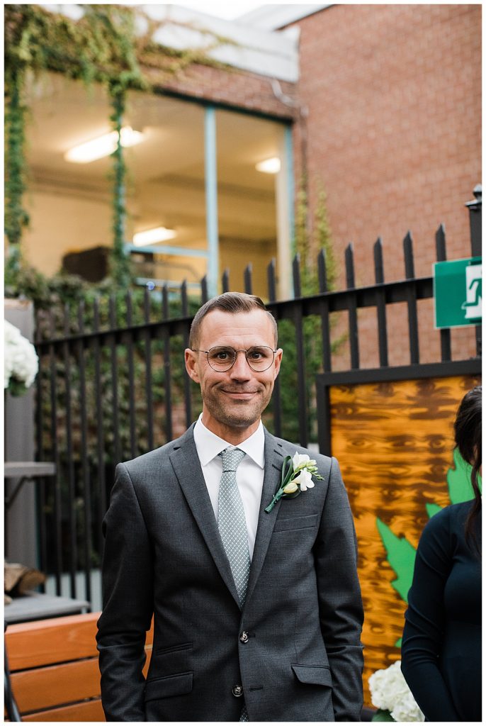 Groom smiles while awaiting bride to walk down aisle| Maple Leaf Tavern wedding| Toronto wedding photographer| Toronto engagement photographer| 3photography 