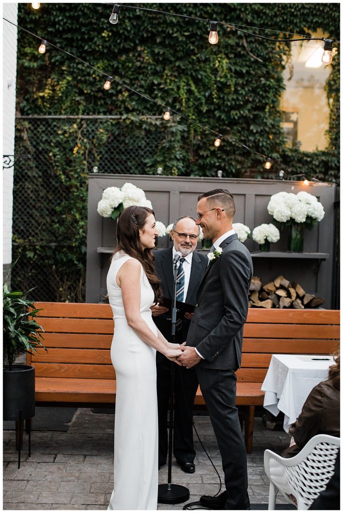 Bride and groom looking into each other eyes at alter| Maple Leaf Tavern wedding| Downtown Toronto wedding| Toronto wedding photographer| 3photography